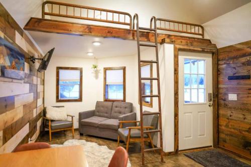 a living room with a bunk bed in a house at Teton Tiny Home | Jackson, Targhee, Yellowstone in Victor