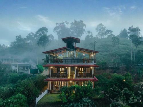 a house in the middle of a forest at Hotel Levon Ella in Ella