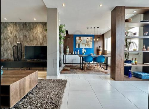 a living room with a kitchen and a dining room at Best 2 bedroom condo 3 bathroom in Rio de Janeiro