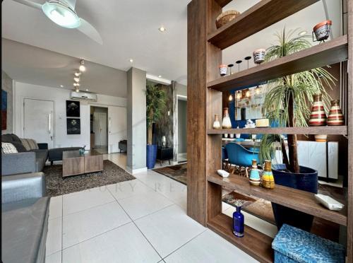 a living room with a couch and a table at Best 2 bedroom condo 3 bathroom in Rio de Janeiro