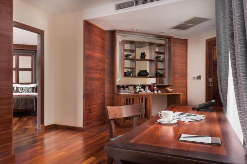 Ein Sitzbereich in der Unterkunft J7 Angkor Hotel