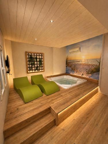 a jacuzzi tub in the middle of a room at Villa Irabo in Albenga