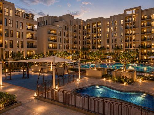 Bareez Bliss Retreat Elegant 2BR with Balcony, Pool & Park View