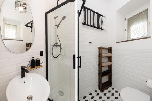 a bathroom with a shower and a toilet and a sink at Sienna Central Studio & Parking in Warsaw