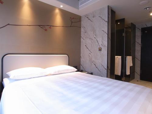 Cama o camas de una habitación en Hotel Midtown Richardson - Kaohsiung Bo'ai