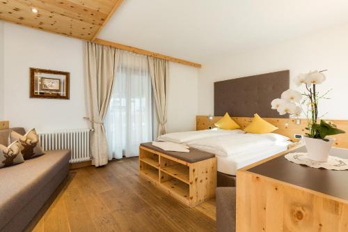 Postel nebo postele na pokoji v ubytování Hotel Bel Sit