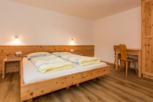 Postel nebo postele na pokoji v ubytování Zolerhof