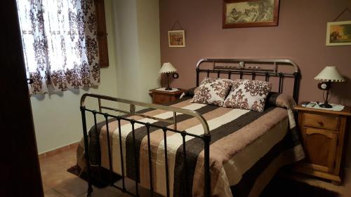 Postel nebo postele na pokoji v ubytování Apartamentos Rurales Tauro