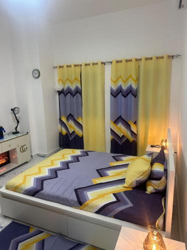 a large bed in a room with curtains at Little friend #1 Two balconies,elevator in Boca Chica