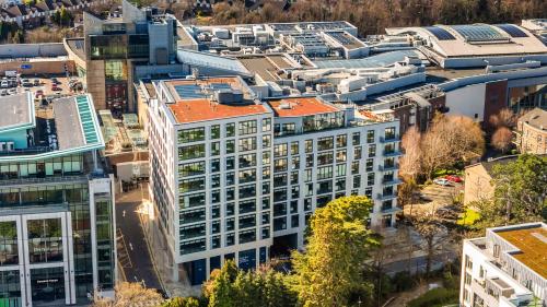 an aerial view of a city with buildings at Apex Executive Apartments - The Ironworks in Dublin