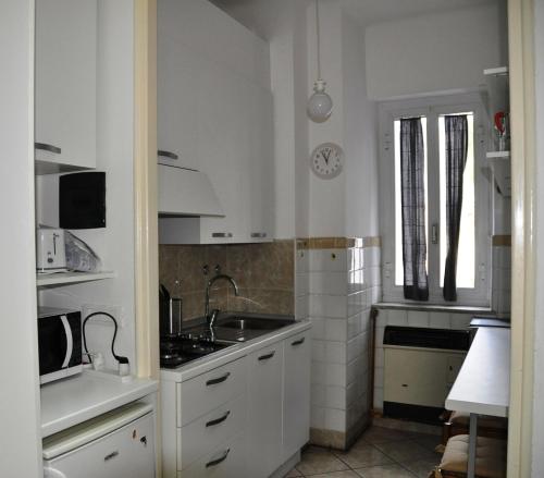 Kuchyň nebo kuchyňský kout v ubytování Bilocale Imperatrice