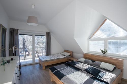 Postel nebo postele na pokoji v ubytování Apartments Teja