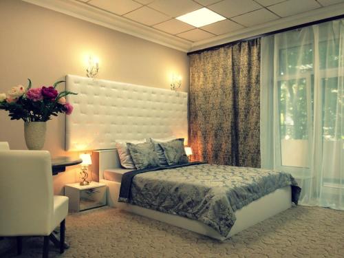 Кровать или кровати в номере Бутик Отель Дворянское Гнездо