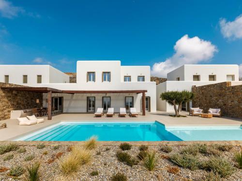 a view of a villa with a swimming pool at Villa Venti Private Pool Retreat, Mykonos in Agios Ioannis Mykonos