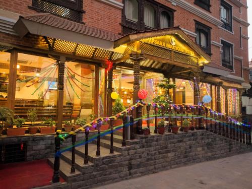 a store front with a bunch of decorations in front at Apsara Boutique Hotel in Kathmandu