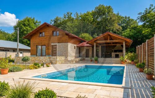 Lovely Home In Smiljan With Sauna