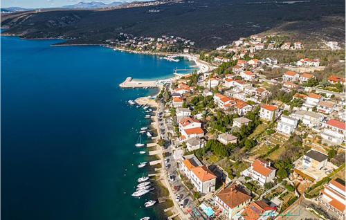 an aerial view of a town next to a body of water at Cozy Apartment In Jadranovo in Jadranovo