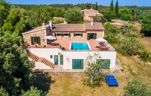 an aerial view of a villa with a swimming pool at Can Baldo in Sencelles