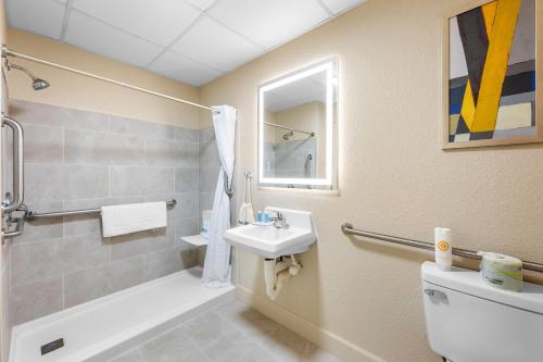 a bathroom with a sink and a shower and a toilet at Comfort Inn Pikeville in Pikeville