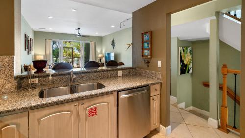 a kitchen with a sink and a counter at 203 Mariners Club in Key Largo