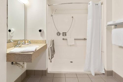 a bathroom with a shower and a sink at Comfort Inn Somerset in Somerset