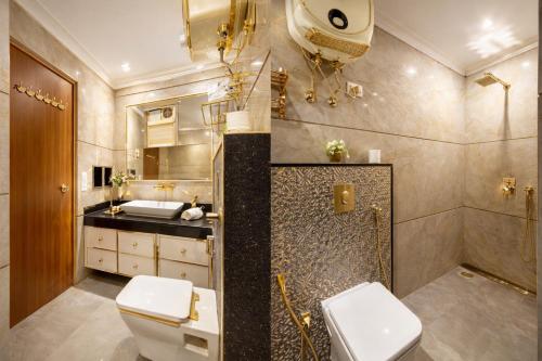 a bathroom with a toilet and a shower and a sink at Corporate Terminal Stay By Velocity Hotels Delhi IGI Airport Terminal 3 With Free Airport Pickup in New Delhi