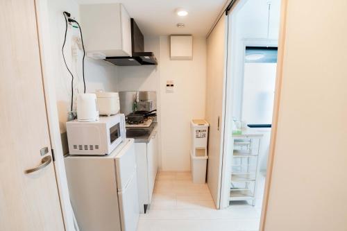 102Room 5 min walk from Gotanno station 20sqm apartment with private toilet and bathroom Direct access to popular travel destinations such as Ueno