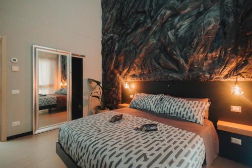 Llit o llits en una habitació de Oltre Exclusive