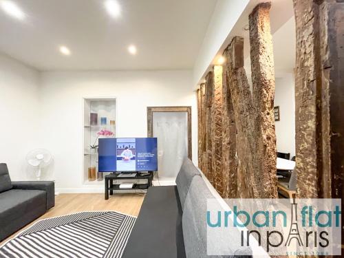 UrbanFlat 52 - Paris Center Fresh Apartment