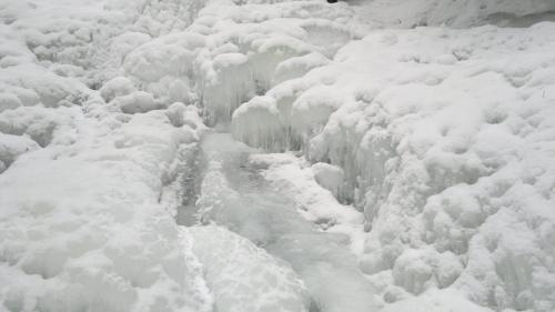 a street covered in snow at Apartmány Kuřátko in Benecko