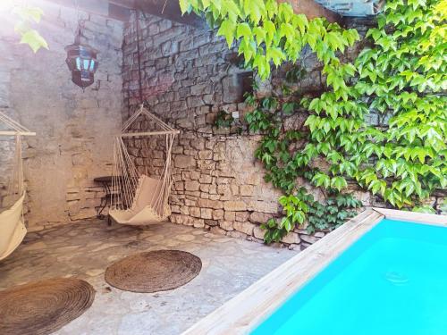 Piscina a La Maison De Thomas o a prop