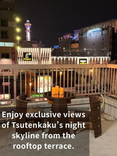 an empty exclusive views of tashkentinkis nightime from the rooftop at 登福桜 動物園前駅4番出口徒歩1秒 通天閣5分 難波駅10分 大阪駅15分 関西空港直通 usj25分 in Osaka