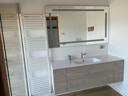 a bathroom with a sink and a mirror at Dolce Vita in Altivole