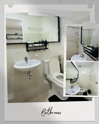 a bathroom with a toilet and a sink at A cozy modern design Unit 6425 in Cebu City