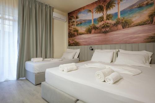 Krevet ili kreveti u jedinici u okviru objekta Sunset Hotel
