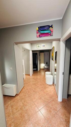 an empty room with a room with a room at Ava Apartments in Omišalj