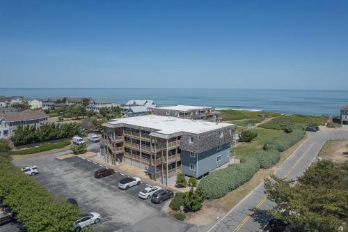 an aerial view of a building with a parking lot at 4104 - Sever's Hideaway in Duck