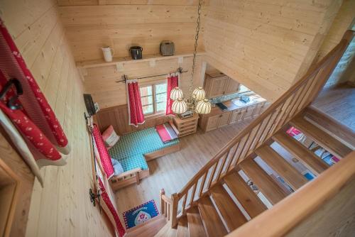 an overhead view of a tiny house with a staircase at Riggeralm in Rangersdorf
