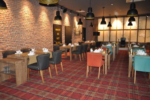 Un restaurante o sitio para comer en Livello Hotel