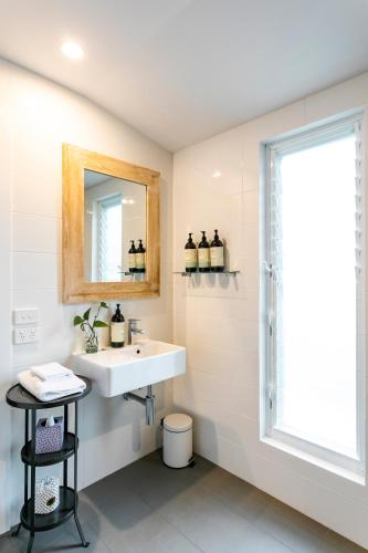 a bathroom with a sink and a mirror at Stablebase in Albany