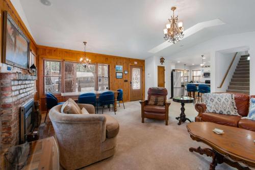 a living room with a couch and a table at Royal Retreat Quiet & Cozy in South Lake Tahoe