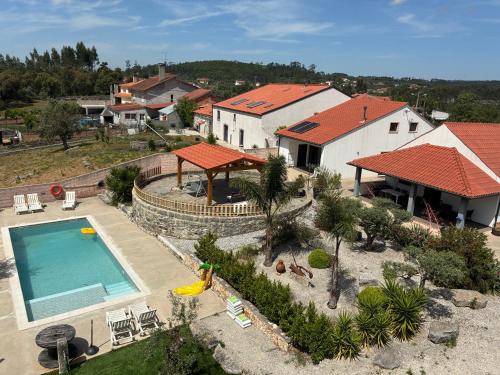 an aerial view of a house with a swimming pool at Casas da Ladeia - Villa 2 in Alvorge