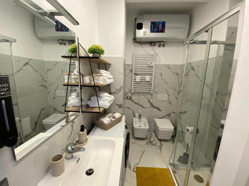 a bathroom with a shower and a sink at Leo&Franci Loft in Legnano