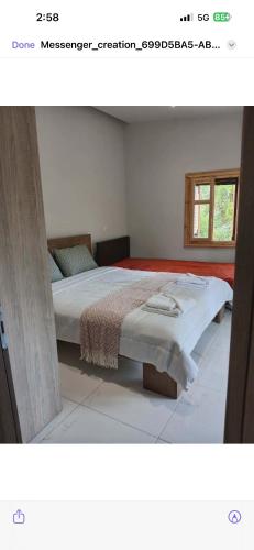 a bedroom with a large bed in a room at Nafplio Garden House in Nea Tiryntha