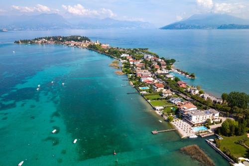 an aerial view of a small island in the water at Hotel Tre Vele in Sirmione