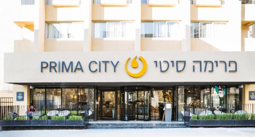 a store front of a prima city building at Prima City Hotel in Tel Aviv