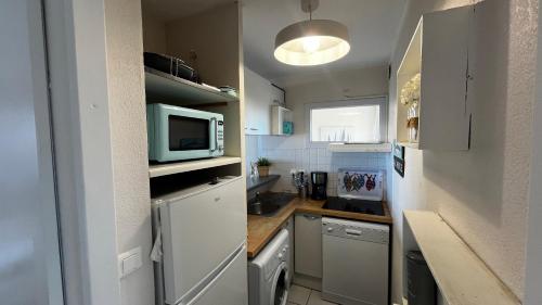 Vue mer exceptionnelle T3, clim, piscine, parking privé 4GRSUD504
