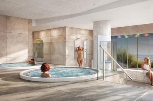 a rendering of two hot tubs in a hotel at Novotel Avignon Centre in Avignon