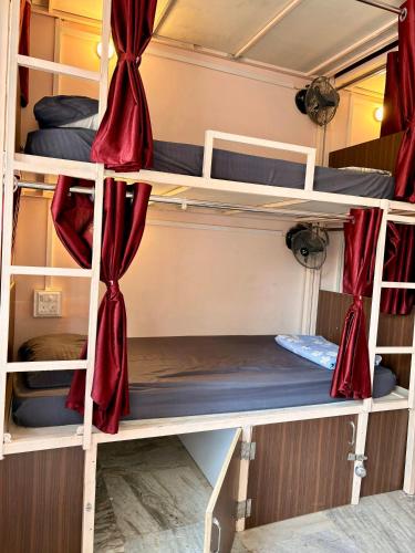 a group of bunk beds in a dorm room at 5 Star Yatri Vishram AC & Non AC Dormitory in Jabalpur