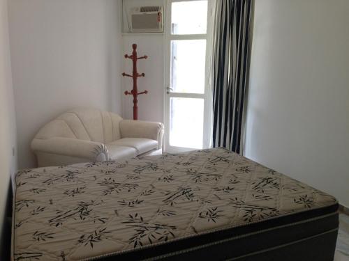 Postel nebo postele na pokoji v ubytování Buzios Internacional